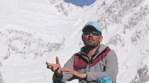 Mehboob Ali, 27, from Arandu, Pakistan, poses with the national flag atop Nanga Parbat (8,125 metres) after reaching the summit on June 30 at 12:13 p.m. The expedition team returned to Chilas today following the successful ascent. Mehboob Ali is among the four Pakistani climbers including Abbas Ali Arandu, Muhammad Ali Hushe and Ilyas Hushe to summit the mountain this year.
