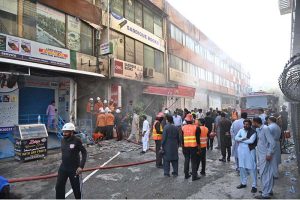 Firefighters coping to control fire erupted in the basement of a shopping mall in Karachi Company G-9 Markaz.