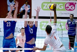 Bangladesh and Kazakhstan players engage in an intense battle at the net during their CAVA Men's Volleyball Championship 2026 clash at the Liaquat Gymnasium, Pakistan Sports Complex.