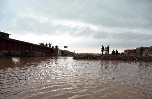 Residential area and buildings remain partially submerged after heavy monsoon rains caused the water level of the Ravi River to rise in Rana Town on the outskirts of the provincial capital.