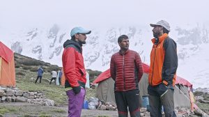 Mehboob Ali, 27, from Arandu, Pakistan, poses with the national flag atop Nanga Parbat (8,125 metres) after reaching the summit on June 30 at 12:13 p.m. The expedition team returned to Chilas today following the successful ascent. Mehboob Ali is among the four Pakistani climbers including Abbas Ali Arandu, Muhammad Ali Hushe and Ilyas Hushe to summit the mountain this year.