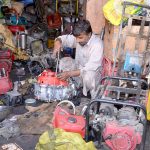A mechanic assemble power generators to meet rising demand amid electricity shortages during the hot weather