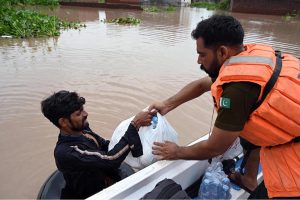 Residential area and buildings remain partially submerged after heavy monsoon rains caused the water level of the Ravi River to rise in Rana Town on the outskirts of the provincial capital.