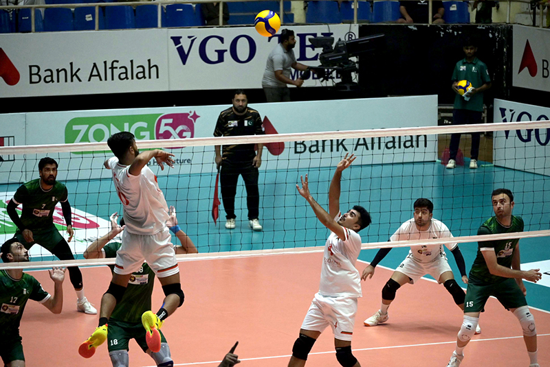 Bangladashi players engage in an intense battle at the net against Pakistani team during the Final Match & Closing Ceremony of the CAVA Men’s Volleyball Championship 2026 at Liaquat Gymnasium in the federal capital