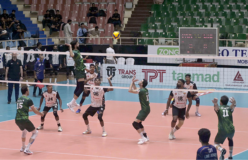 Players of Pakistan and Sri Lanka compete during the opening match of the CAVA Men's Volleyball Championship 2026 at the Liaquat Gymnasium Hall, Pakistan Sports Complex, in the federal capital