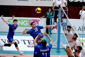 Bangladesh and Kazakhstan players engage in an intense battle at the net during their CAVA Men's Volleyball Championship 2026 clash at the Liaquat Gymnasium, Pakistan Sports Complex.