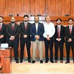 Students from Jinnah Law College, Jhelum, Punjab, pose for a group photograph in the Senate Hall at Parliament House