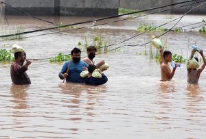Residential area and buildings remain partially submerged after heavy monsoon rains caused the water level of the Ravi River to rise in Rana Town on the outskirts of the provincial capital.