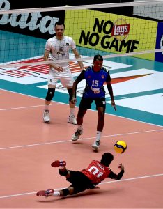 Pakistan and Sri Lanka players battle at the net during the semifinal of the CAVA Men's Volleyball Championship 2026 at Liaquat Gymnasium, Pakistan Sports Complex, displaying attacking prowess and solid defensive skills in a fiercely contested match
