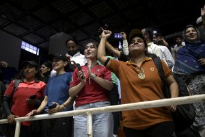 Volleyball fans celebrate Pakistan's victory after the final match of the CAVA Men’s Volleyball Championship 2026 during the closing ceremony at Liaquat Gymnasium, Pakistan Sports Complex, in the federal capital