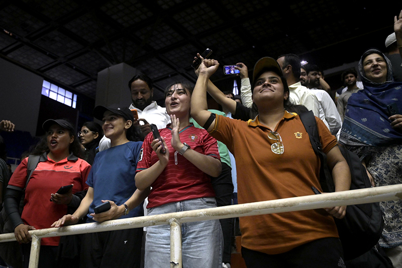 Volleyball fans celebrate Pakistan's victory after the final match of the CAVA Men’s Volleyball Championship 2026 during the closing ceremony at Liaquat Gymnasium, Pakistan Sports Complex, in the federal capital