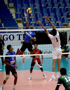 Pakistan and Sri Lanka players battle at the net during the semifinal of the CAVA Men's Volleyball Championship 2026 at Liaquat Gymnasium, Pakistan Sports Complex, displaying attacking prowess and solid defensive skills in a fiercely contested match