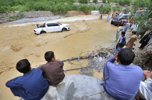 Flash floodwaters inundate roads and surrounding areas after heavy monsoon rains lashed Landi Kotal.