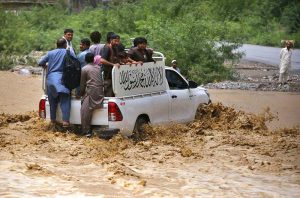 Flash floodwaters inundate roads and surrounding areas after heavy monsoon rains lashed Landi Kotal.