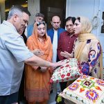 Vice chancellor Govt college woman University Sialkot Professor Dr, Shazia Bashir & President SCCI Syed Ehtesham Mazhar Gilani are viewing on display items during the exhibition of Art and Design at SCCI