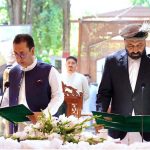 Syed Mehdi Shah, Governor of Gilgit-Baltistan, administers the oath to newly elected Chief Minister of Gilgit-Baltistan, Advocate Amjad Hussain, during a ceremony