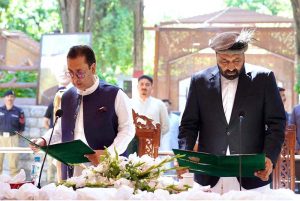 Syed Mehdi Shah, Governor of Gilgit-Baltistan, administers the oath to newly elected Chief Minister of Gilgit-Baltistan, Advocate Amjad Hussain, during a ceremony