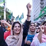 Members of the All Parties Hurriyat Conference J&K and various political parties chant slogans during a rally marking the martyrdom anniversary of Kashmiri freedom leader Burhan Wani