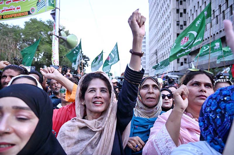 Members of the All Parties Hurriyat Conference J&K and various political parties chant slogans during a rally marking the martyrdom anniversary of Kashmiri freedom leader Burhan Wani