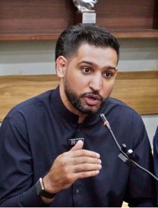 International boxing star Amir Khan speaks to media representatives during a visit to the Karachi Press Club