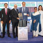 Federal Minister for Planning, Development & Special Initiatives, Professor Ahsan Iqbal, holding the latest issue of Development Advocate Pakistan during its launch at the Strategic Dialogue on “A Nation at a Turning Point: Demographics and Development in Pakistan”
