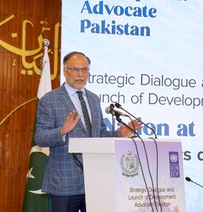 Federal Minister for Planning, Development & Special Initiatives, Professor Ahsan Iqbal, holding the latest issue of Development Advocate Pakistan during its launch at the Strategic Dialogue on “A Nation at a Turning Point: Demographics and Development in Pakistan”