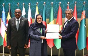 Federal Minister for Law and Justice Azam Nazeer Tarar presents a certificate of recognition to Dr. Maimoonah Al Khalil, Secretary-General of the Family Affairs Council of the Kingdom of Saudi Arabia, in acknowledgment of her outstanding contribution to women's welfare and empowerment during the closing ceremony of the 9th OIC Ministerial Conference on Women, held under the theme "Socio-Economic and Political Empowerment of Women in the OIC Countries: Challenges and Way Forward," at the Convention Centre