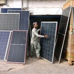 A vendor displaying solar penal to attract the customer at station road
