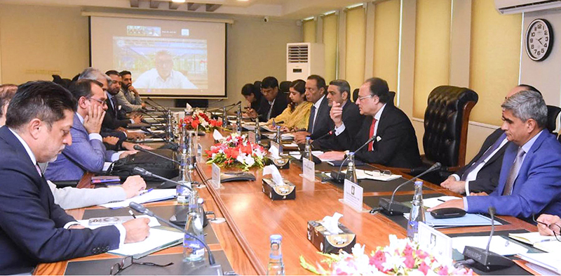 Federal Minister for Finance and Revenue, Senator Muhammad Aurangzeb, chairing the second meeting of the Committee on Genetically Modified (GM) Corn at the Finance Division in the federal capital