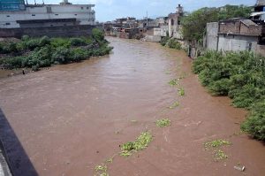 A view of the swollen Korang Nullah at Ghouri Town following heavy rainfall in the twin cities after the opening of Rawal Dam spillways, causing a significant rise in the water level