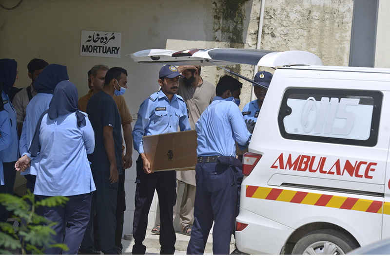 Bodies of newborn babies are shifted from the morgue to an ambulance following a tragic fire at the Mother and Child Health (MCH) Ward of Pakistan Institute of Medical Sciences (PIMS), which claimed the lives of 14 newborn babies