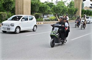 The morning traffic is already beginning to swell when a woman pulls down her helmet, places both hands firmly on the handlebar of her scooty and joins the moving stream of vehicles. There is nothing unusual about a vehicle entering traffic, yet the scene carries a significance that goes beyond the road. A woman who once waited for someone else to drive her is now choosing her own route, timing her own journey and deciding when she will return. (Match the photo with APP feature slugged “From passenger seat to handlebar: women take control of their journeys” already been released)