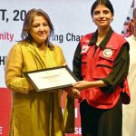 Chairperson of the Pakistan Red Crescent Society (PRCS), Farzana Naek, distributes certificates among volunteers during a seminar marking International Youth Day and International Humanitarian Law (IHL) Day at PRCS