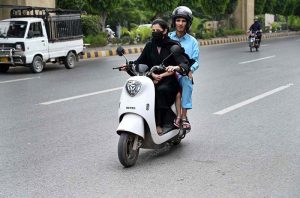 The morning traffic is already beginning to swell when a woman pulls down her helmet, places both hands firmly on the handlebar of her scooty and joins the moving stream of vehicles. There is nothing unusual about a vehicle entering traffic, yet the scene carries a significance that goes beyond the road. A woman who once waited for someone else to drive her is now choosing her own route, timing her own journey and deciding when she will return. (Match the photo with APP feature slugged “From passenger seat to handlebar: women take control of their journeys” already been released)