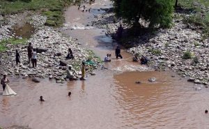 A view of the swollen Korang Nullah at Ghouri Town following heavy rainfall in the twin cities after the opening of Rawal Dam spillways, causing a significant rise in the water level