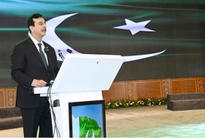 Chairman Senate, Syed Yousuf Raza Gilani, and distinguished guests standing in respect of the national anthem at the Azadi Cultural Show at Jinnah Convention Centre