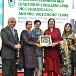 Managing Director of the National Academy of Higher Education (NAHE), Dr. Noor Amna Malik presents shield to Minister of State for Federal Education and Professional Training, Ms. Wajiha Qamar during the opening ceremony of the 'Strategic Planning and Leadership Excellence Programme' for Vice Chancellors and Pro-Vice Chancellors at NIBAF