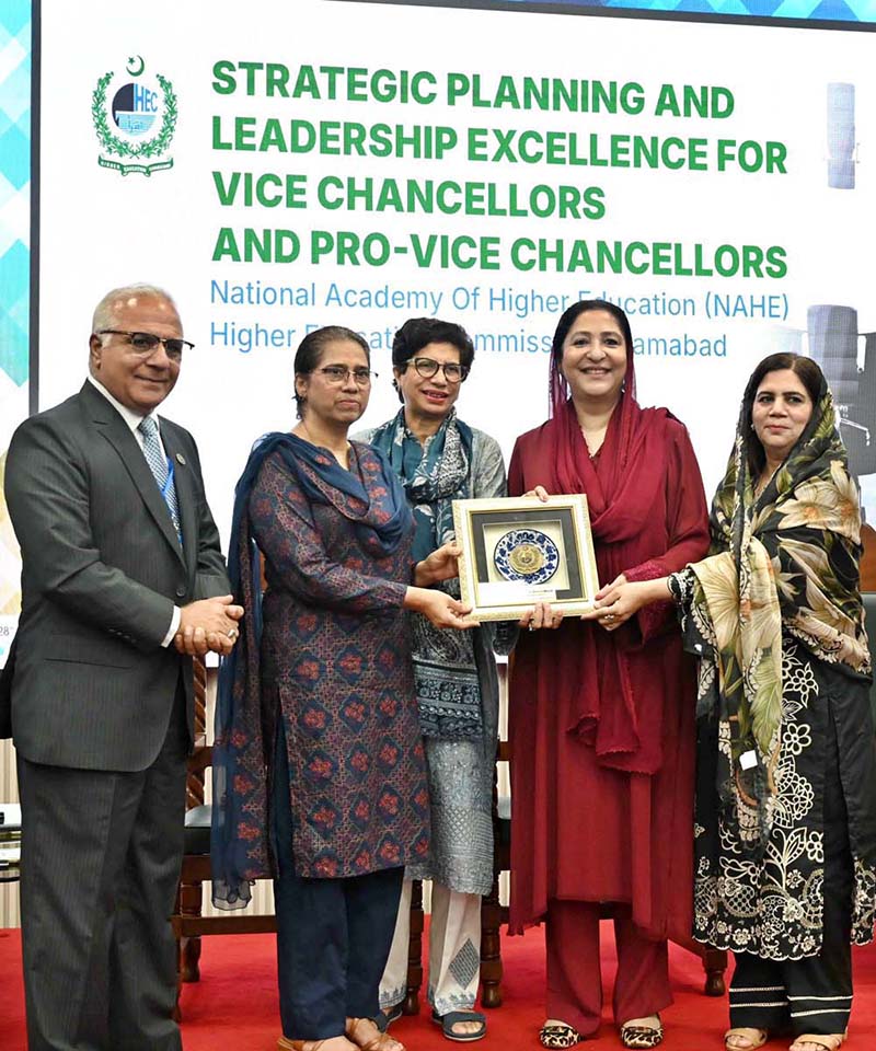 Managing Director of the National Academy of Higher Education (NAHE), Dr. Noor Amna Malik presents shield to Minister of State for Federal Education and Professional Training, Ms. Wajiha Qamar during the opening ceremony of the 'Strategic Planning and Leadership Excellence Programme' for Vice Chancellors and Pro-Vice Chancellors at NIBAF