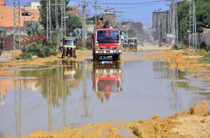 Vehicle passing through sewerage water accumulated on Hali Road needs the attention of concerned authorities.