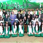 Chairman Senate, Syed Yousuf Raza Gilani in a group photo with parliamentarians, singers, musicians, and children at the Azadi Cultural Show at Jinnah Convention Centre