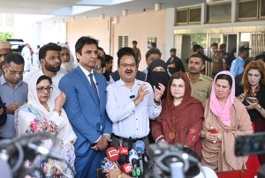 Mahesh Kumar Malani, head of the Parliamentary Standing Committee on Health, leads a committee delegation on a visit to the Pakistan Institute of Medical Sciences (PIMS) following the deaths of 14 newborns in a fire incident at the hospital