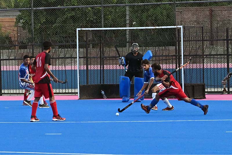 A view of the hockey final match played between Ali Amir Hockey Club and Young Crescent Hockey Club during the Inter-Tehsil Girls and Boys Hockey Championship, organized by the District Sports Department, at Astroturf Hockey Stadium