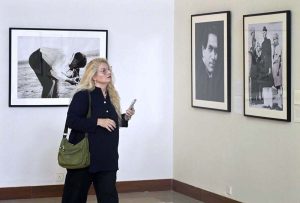 Visitor keenly viewing the photos during photographic exhibition titled “Quaid-i-Azam: The First Governor-General of Pakistan 1947–1948,” at the PNCA.
