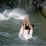 Youngersters are enjoying and playing in water of cannel channel made from of Khanpur dam in KPK most famous picnic point for tourists