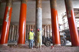 Labourers are busy in construction work of Kabutar Chowk underpass during development work in the city.