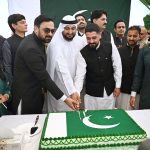 Acting Consul General of Pakistan in Dubai, Mr. Fawad Ali Khan, cuts the Independence Day cake in the presence of officers, officials, members of the Pakistani community and guests at the Consulate General of Pakistan