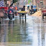 A view of sewerage water accumulated on the road at Liaqat Colony creating problems for motorists and pedestrians and needs the attention of concerned authorities