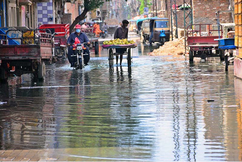 A view of sewerage water accumulated on the road at Liaqat Colony creating problems for motorists and pedestrians and needs the attention of concerned authorities