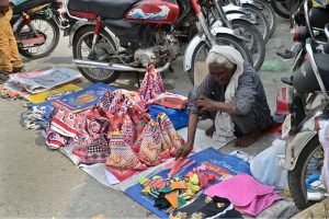 People are busy shopping at the weekly Sunday Bazaar, Peshawar Morr, in the Federal Capital
