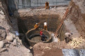 Labourers are busy in construction work of Kabutar Chowk underpass during development work in the city.
